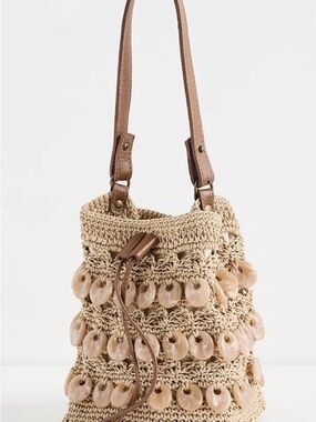 Handwoven Raffia Crossbody Bucket Bag in Natural/Tan with acrylic shell accents